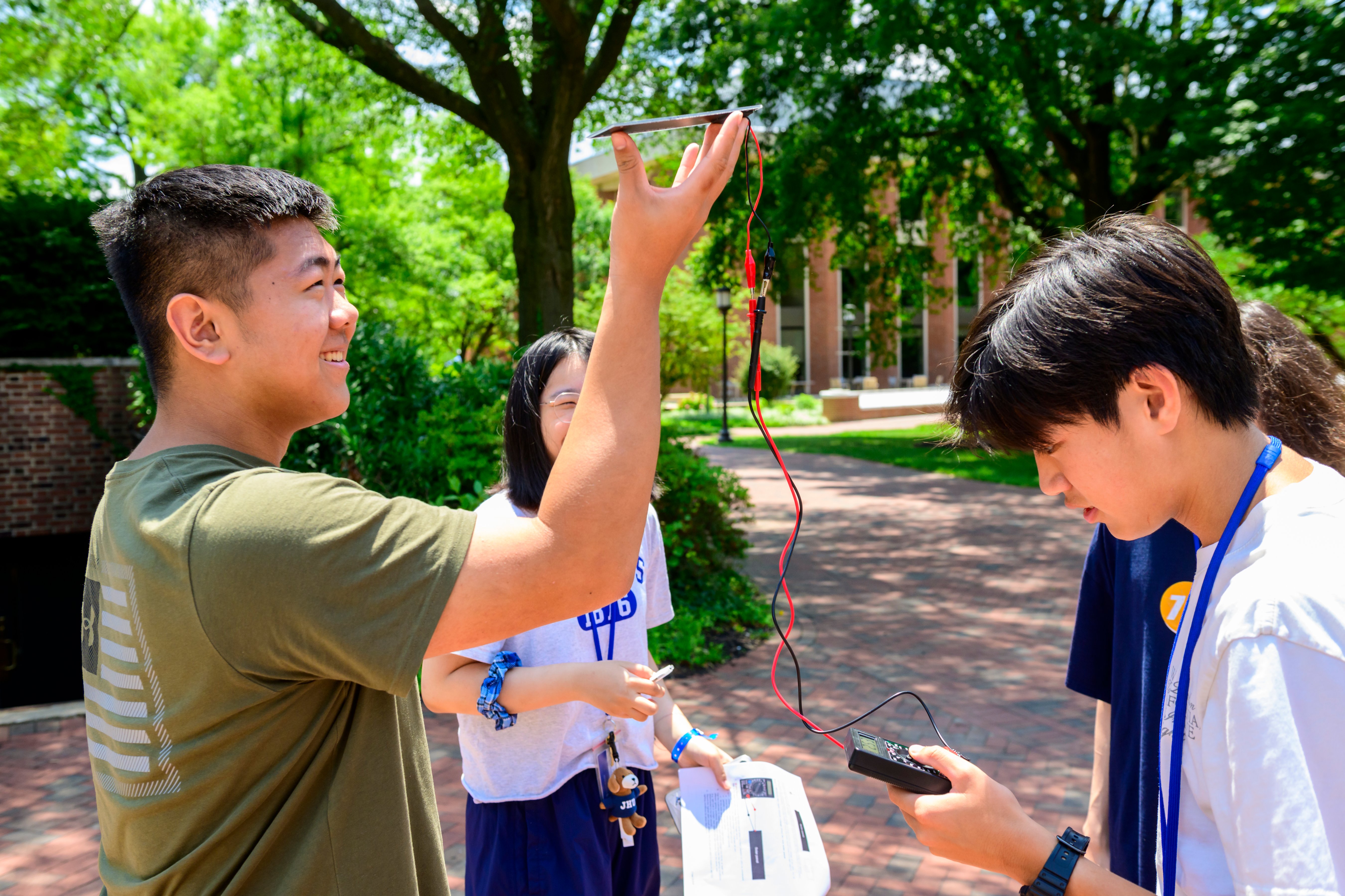Students working outside.